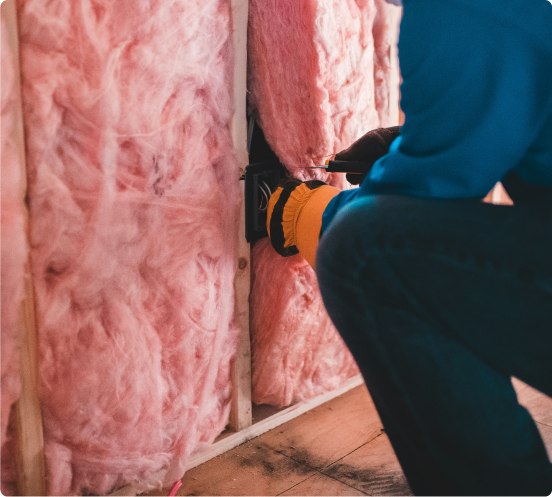 Commercial construction, a man checking electrical wiring
